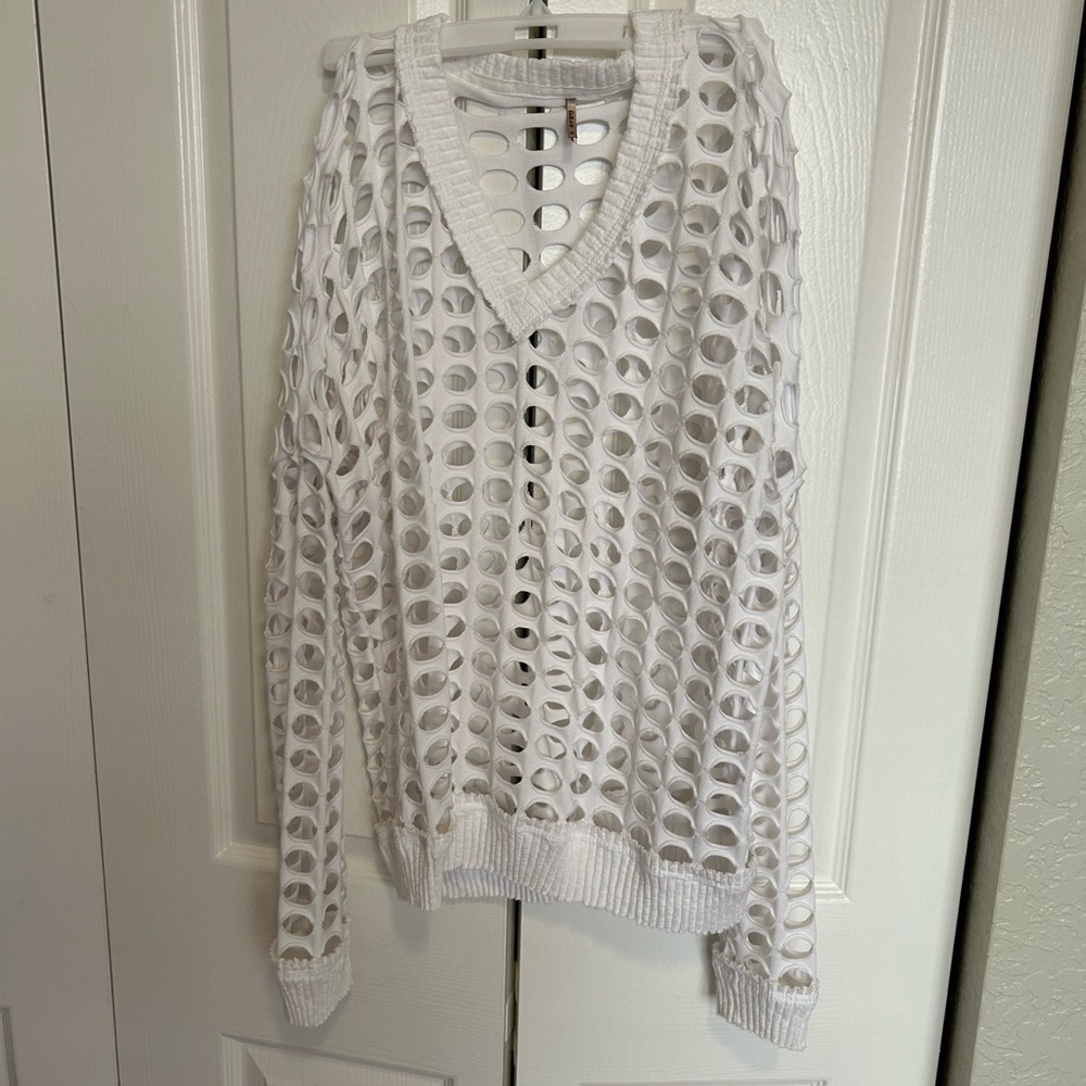 White sweater overlay.